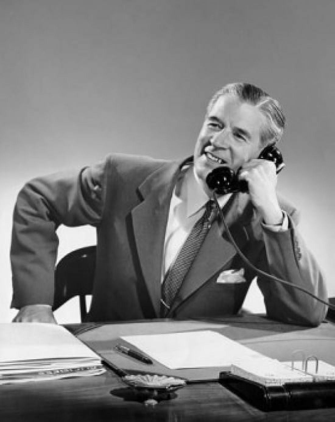 Mature businessman talking on telephone in office Canvas Art - (24 x 36)