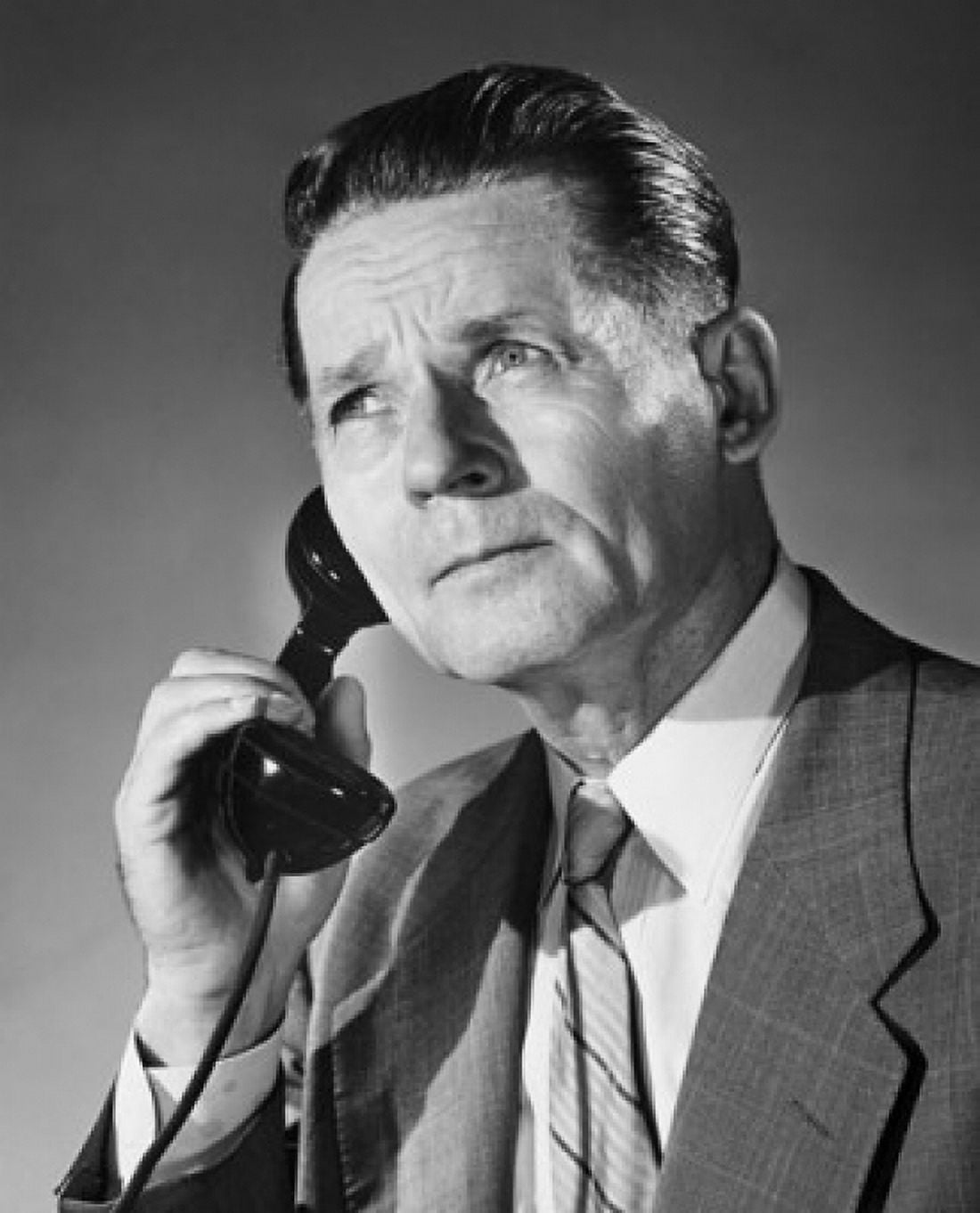 Mature businessman using telephone Canvas Art - (24 x 36)