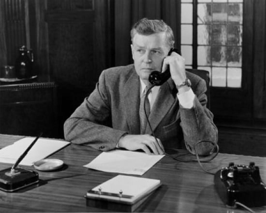 Mature businessman using telephone in office Canvas Art - (18 x 24)