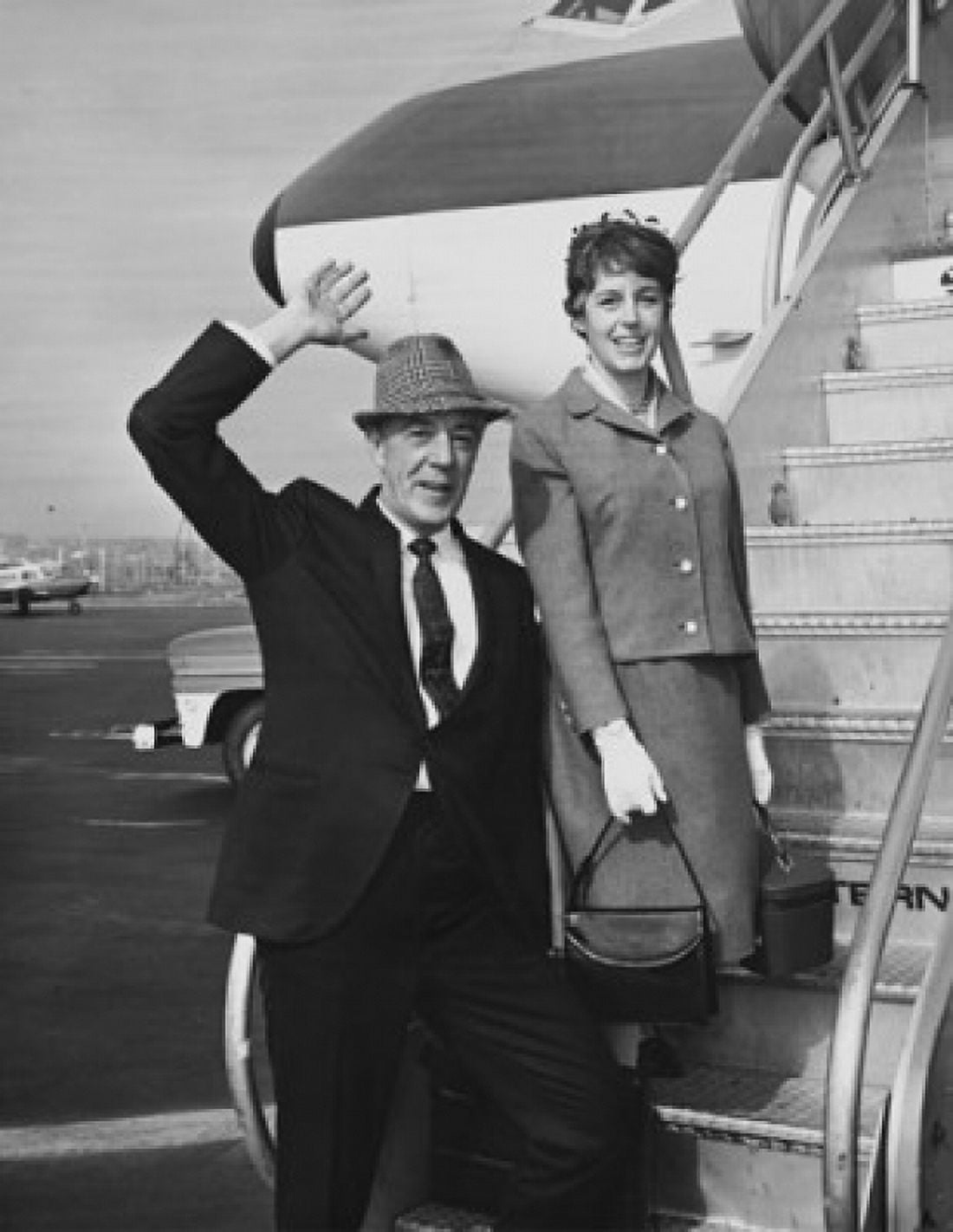 Mature couple boarding an airplane Canvas Art - (18 x 24)