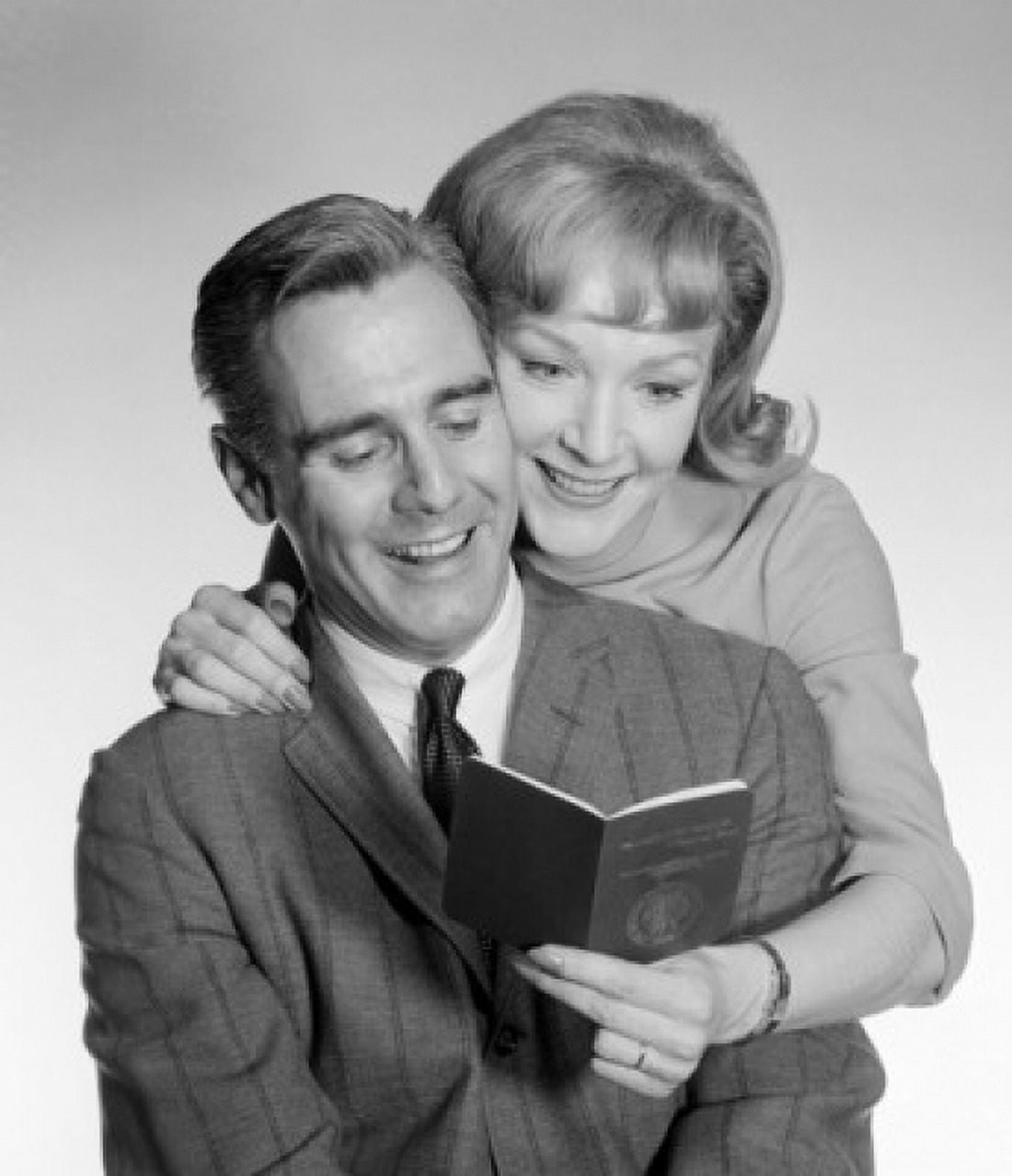 Mature couple holding passport Canvas Art - (18 x 24)