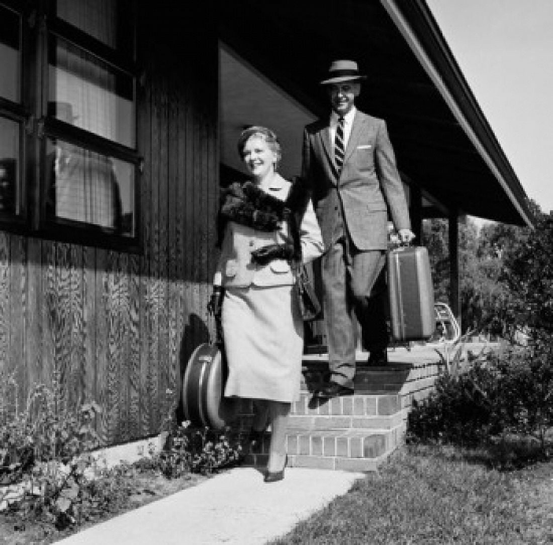 Mature couple leaving for holiday Canvas Art - (24 x 36)