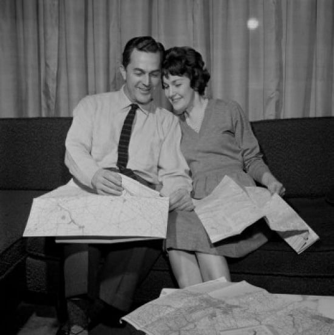 Mature couple reading maps Canvas Art - (24 x 36)