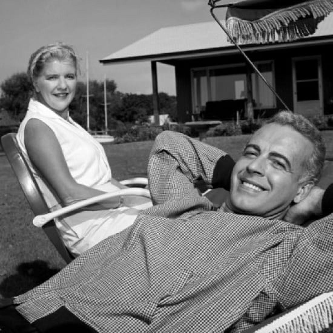 Mature couple relaxing in backyard Canvas Art -  (18 x 24)