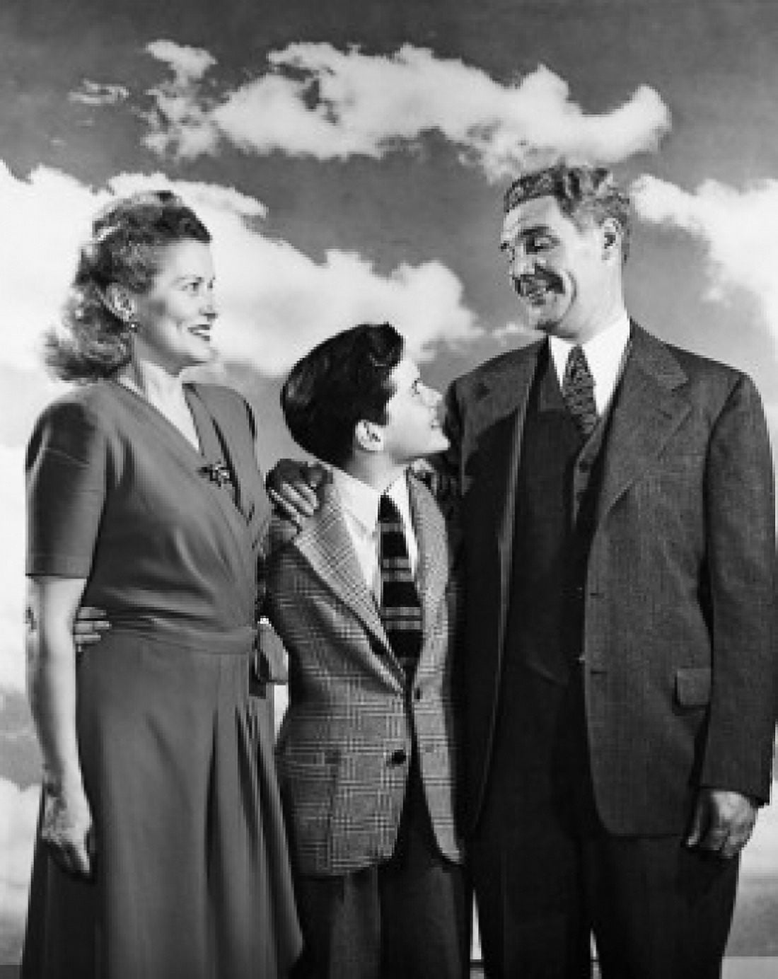 Mature couple standing with their son and smiling Canvas Art - (18 x 24)