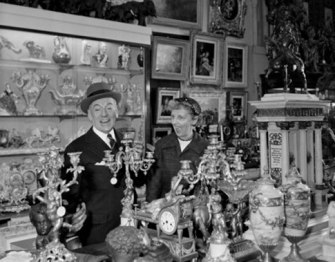 Mature man and mature woman watching decors in store Canvas Art - (18 x 24)