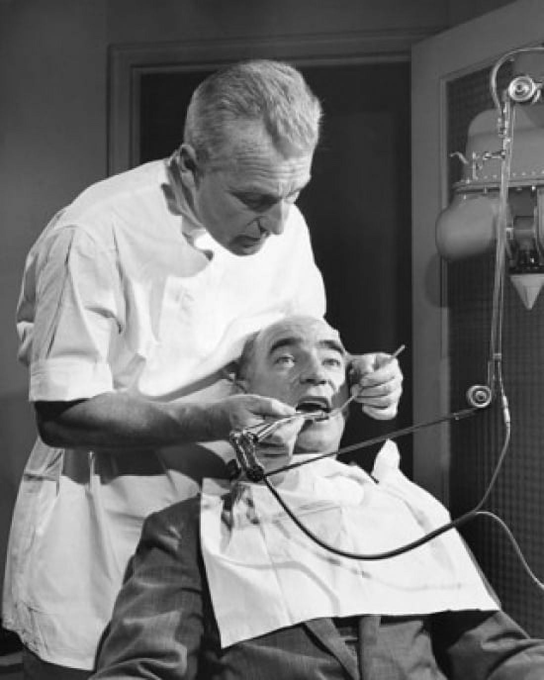 Mature man getting a treatment from a dentist Canvas Art - (18 x 24)