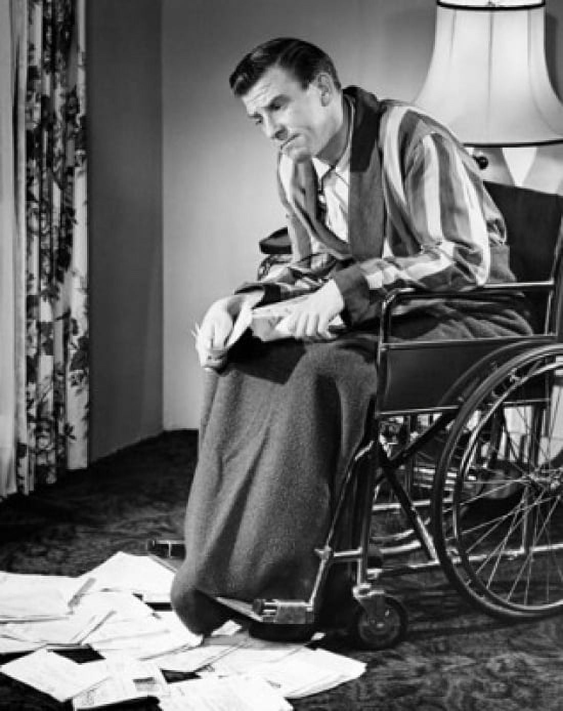 Mature man sitting in a wheelchair and thinking Canvas Art - (18 x 24)