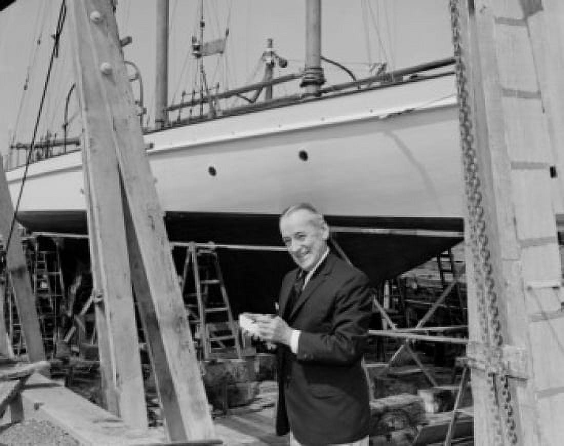 Mature man standing in front of yacht Canvas Art - (18 x 24)