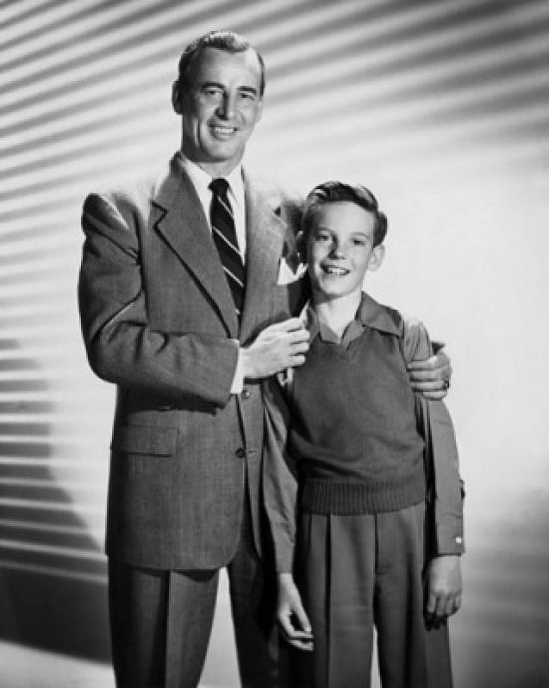 Mature man standing with his arm around his son Canvas Art - (24 x 36)