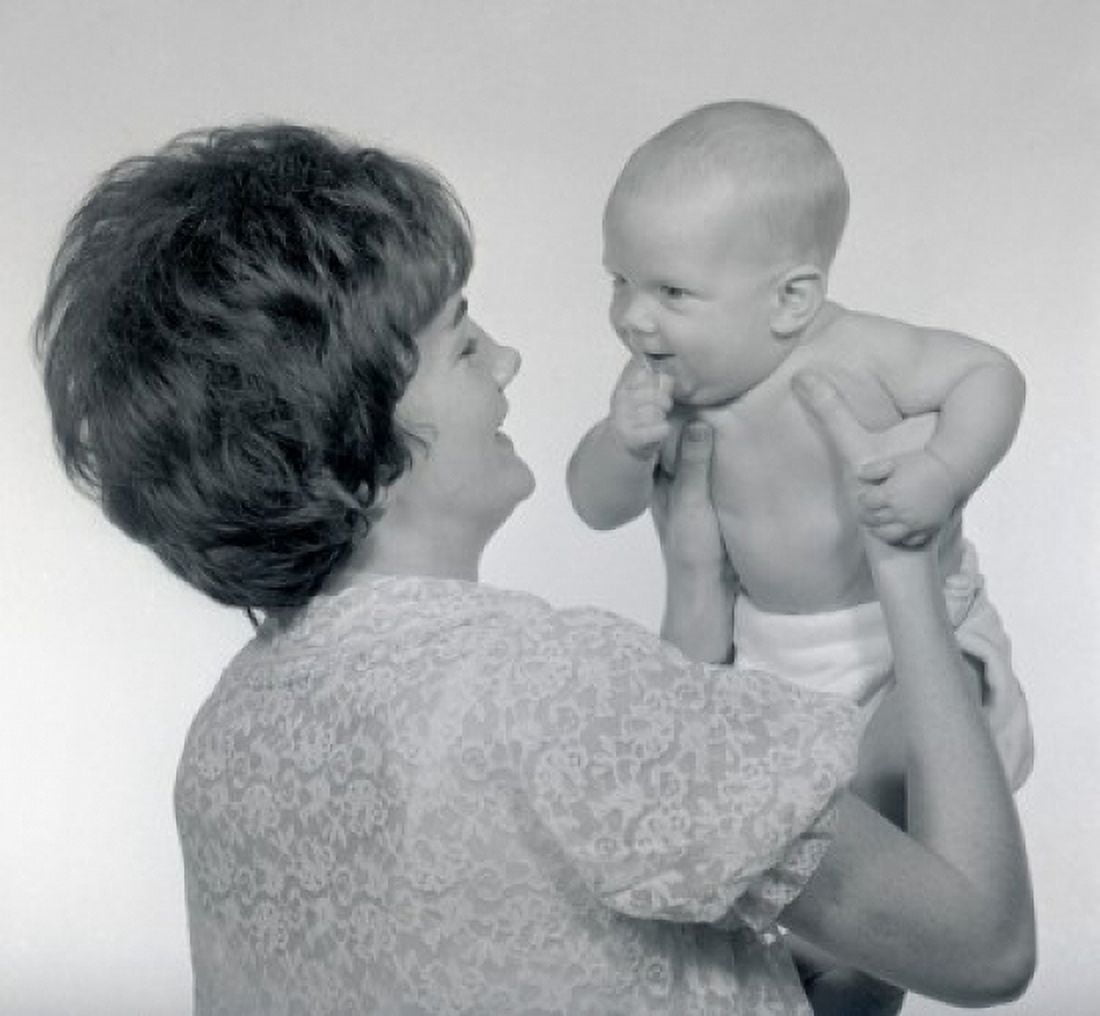 Mature woman holding baby Canvas Art - (18 x 24)