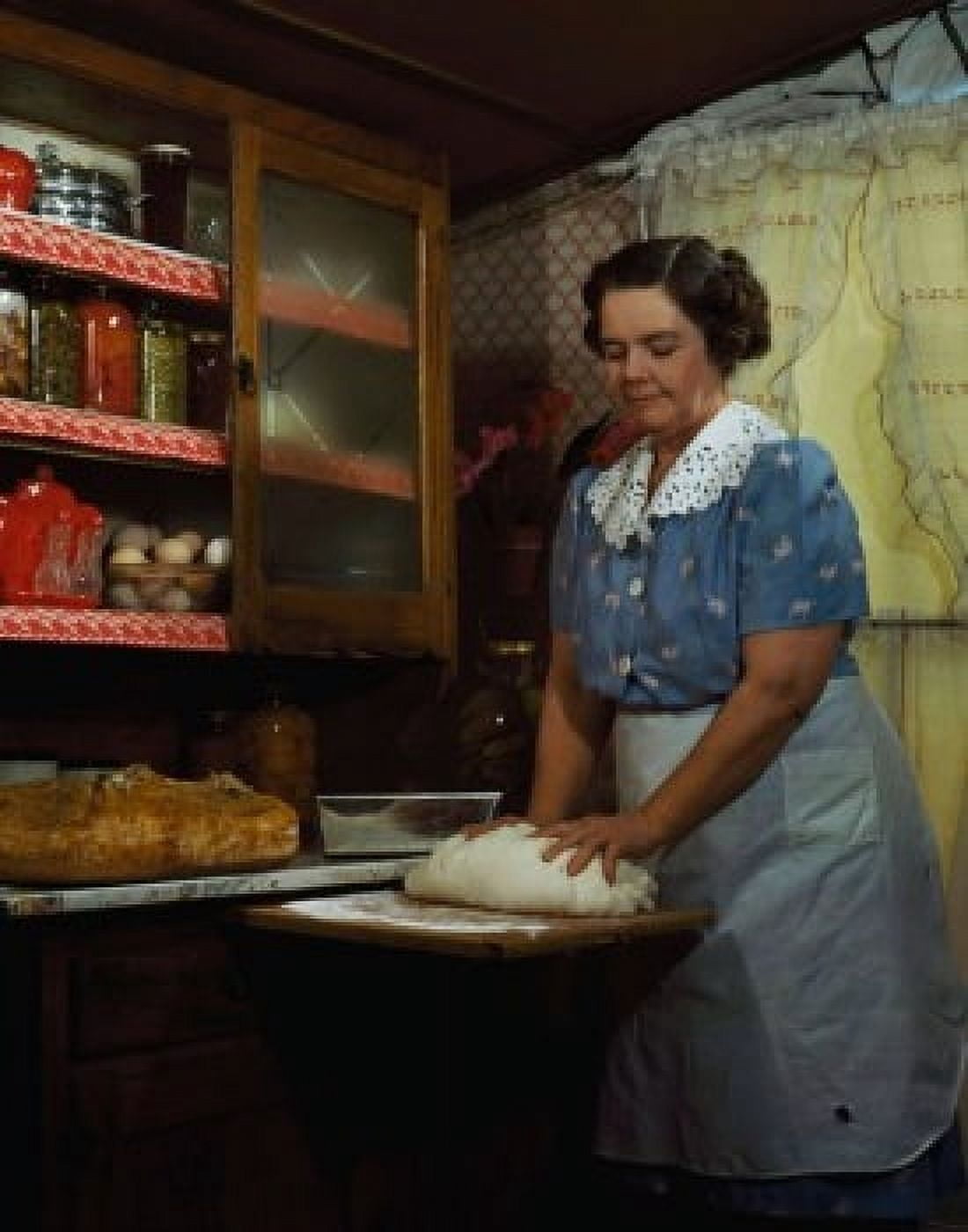 Mature woman kneading dough in a domestic kitchen Canvas Art - (24 x 36)