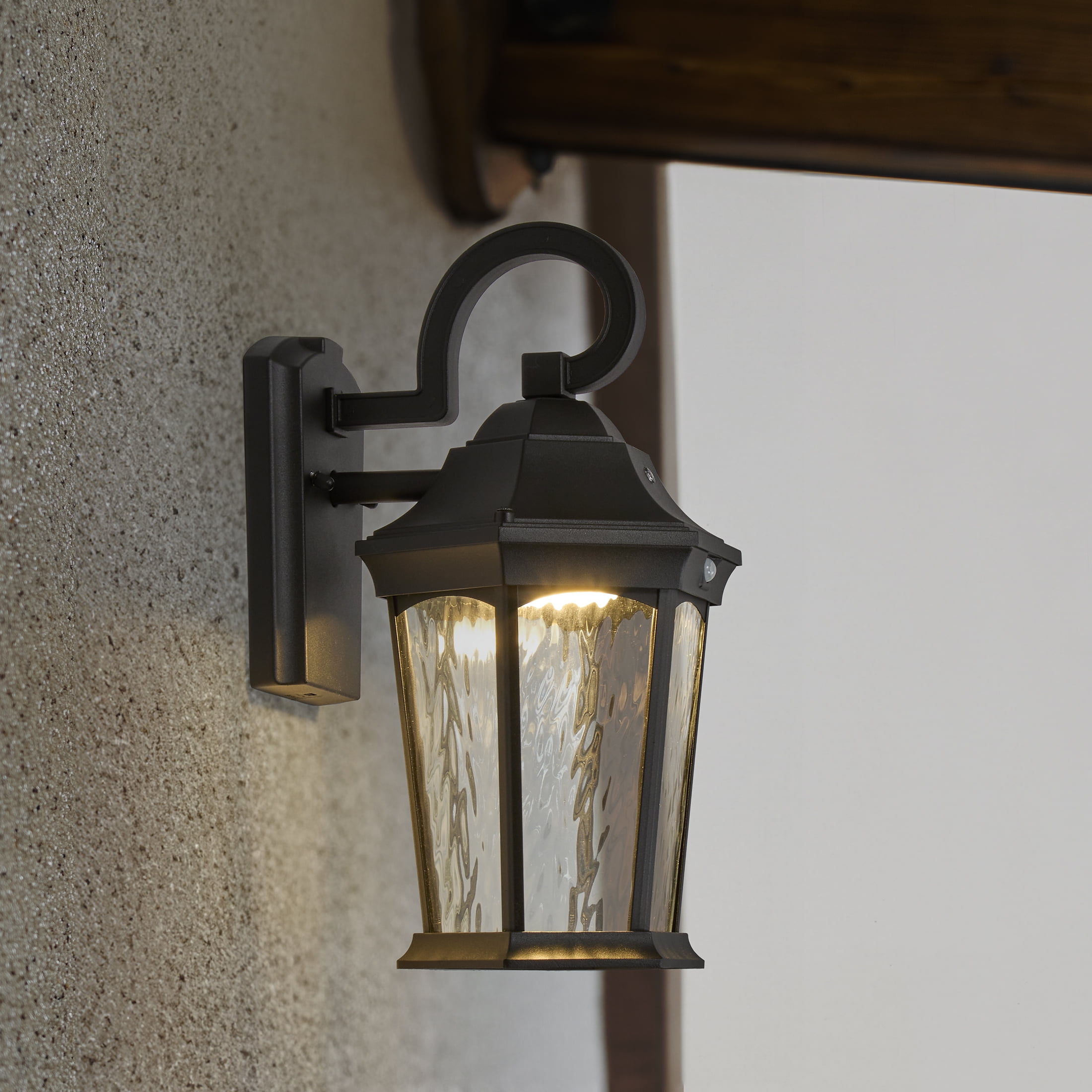 Maxxima LED Motion Sensor Outdoor Wall Light, Dusk to Dawn Sensor, Black w/ Clear Water Glass, 800 Lumens, 3000K Warm White