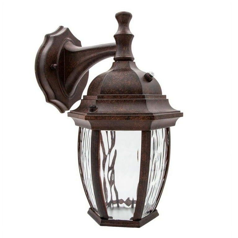 Maxxima LED Outdoor Wall Light, Aged Bronze w/Clear Water Glass, Dusk to Dawn Sensor, 580 Lumens Warm White Maxxima LED Outdoor Wall Light, Aged Bronze w/Clear Water Glass, Dusk to Dawn Sensor, 580 Lumens Warm White