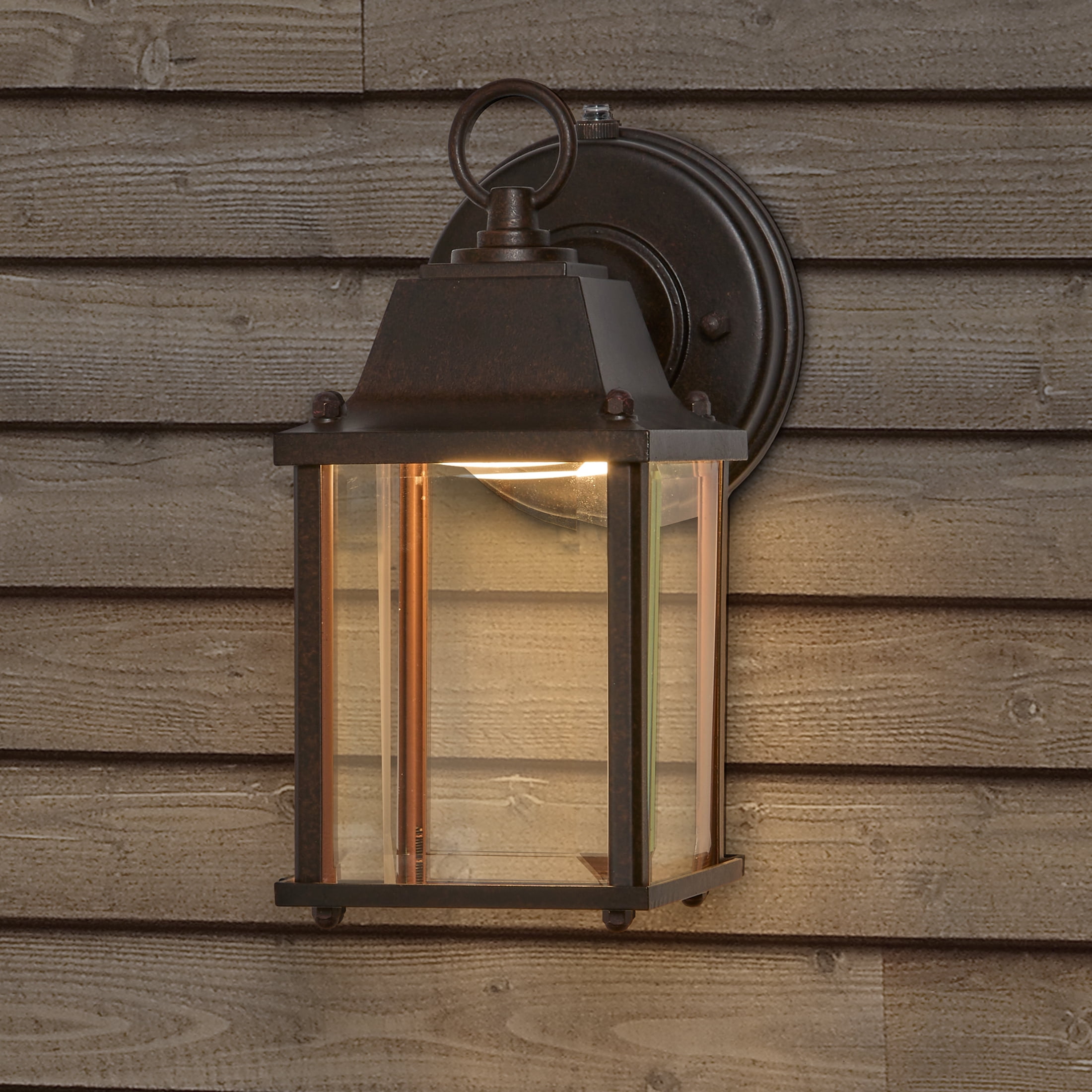 Maxxima LED Porch Lantern Outdoor Wall Light, Aged Bronze w/ Clear Glass, Dusk to Dawn Sensor, 650 Lumens, 3000K Warm White