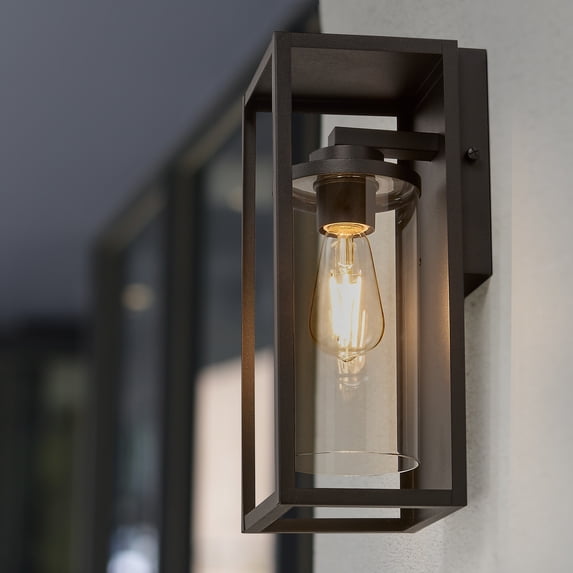 Maxxima Outdoor Wall Sconce, Black Rectangular Fixture w/ Clear Glass Cylinder, Dusk to Dawn Sensor, E26 Socket, Bulbs Not Included