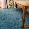 thumbnail image 1 of Maxy Home Bella Solid Turquoise Blue 6 ft. 7 in. x 9 ft. 3 in. Shag Area Rug, 1 of 7