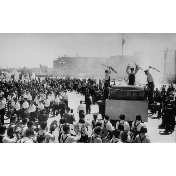May Day In Beijing. People Parade Past A Band With A Massive Drum. Tiananmen Square History