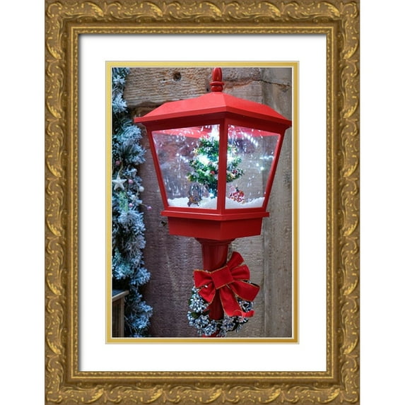McRoberts, Julien 17x24 Gold Ornate Wood Framed with Double Matting Museum Art Print Titled - Strasbourg-France Christmas red lamp post with blowing snow inside