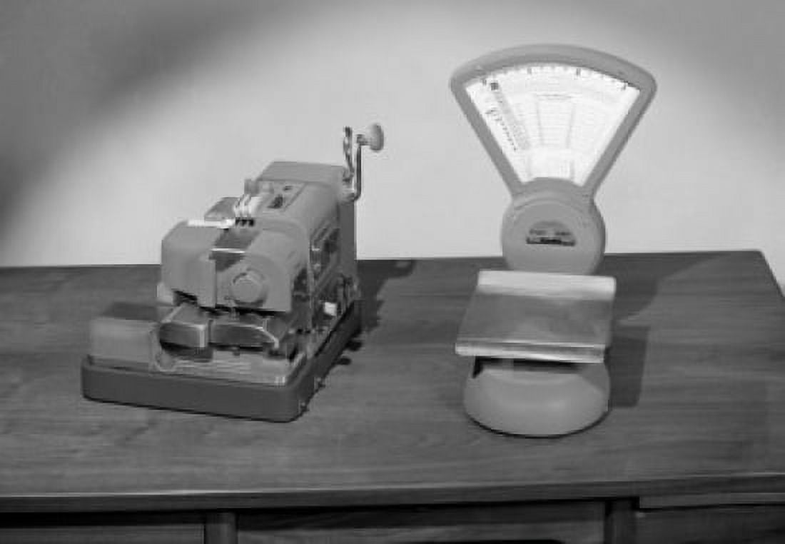Mechanic device and weight scales on desk Canvas Art - (18 x 24)