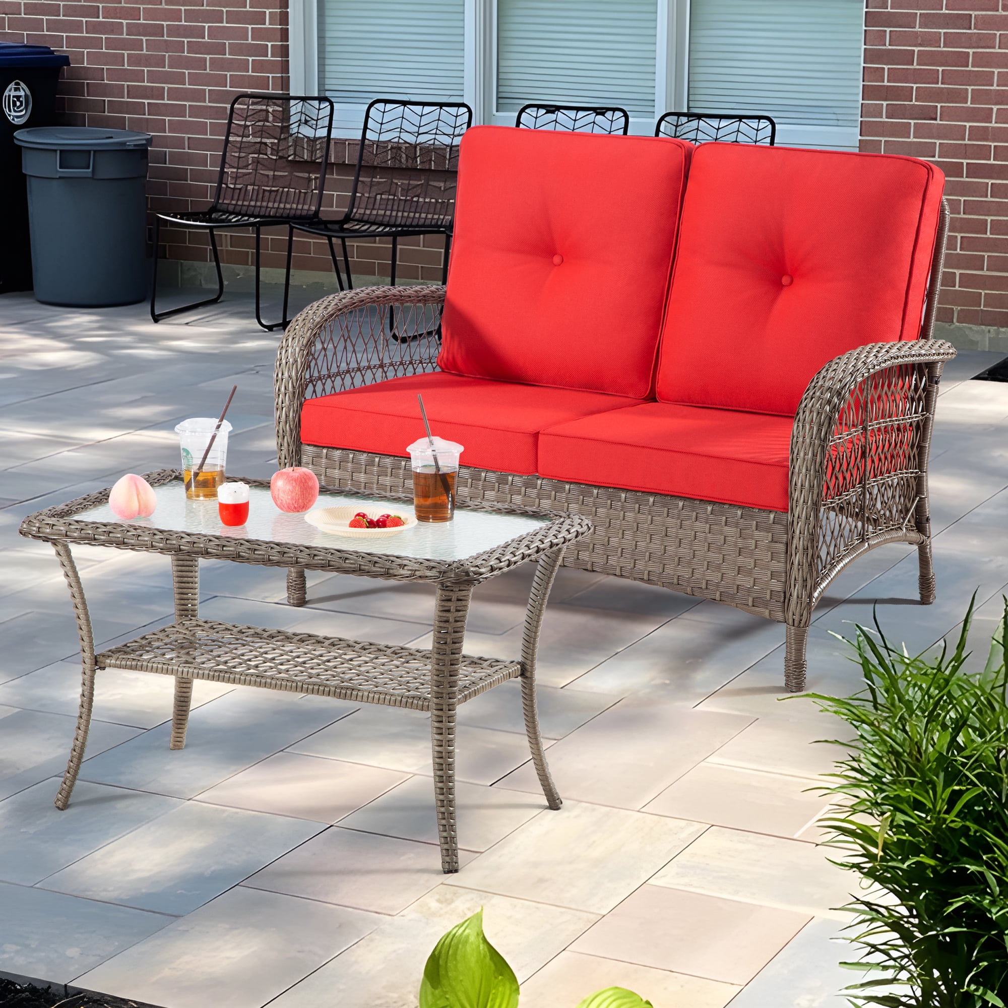 Red Cushioned Wicker Loveseat and Table Set with Black Iron Frame