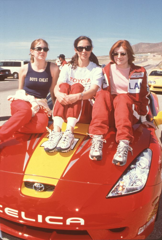 Melissa Joan Hart, Ashley Judd & Alyson Hannigan Sitting On Car Toyota