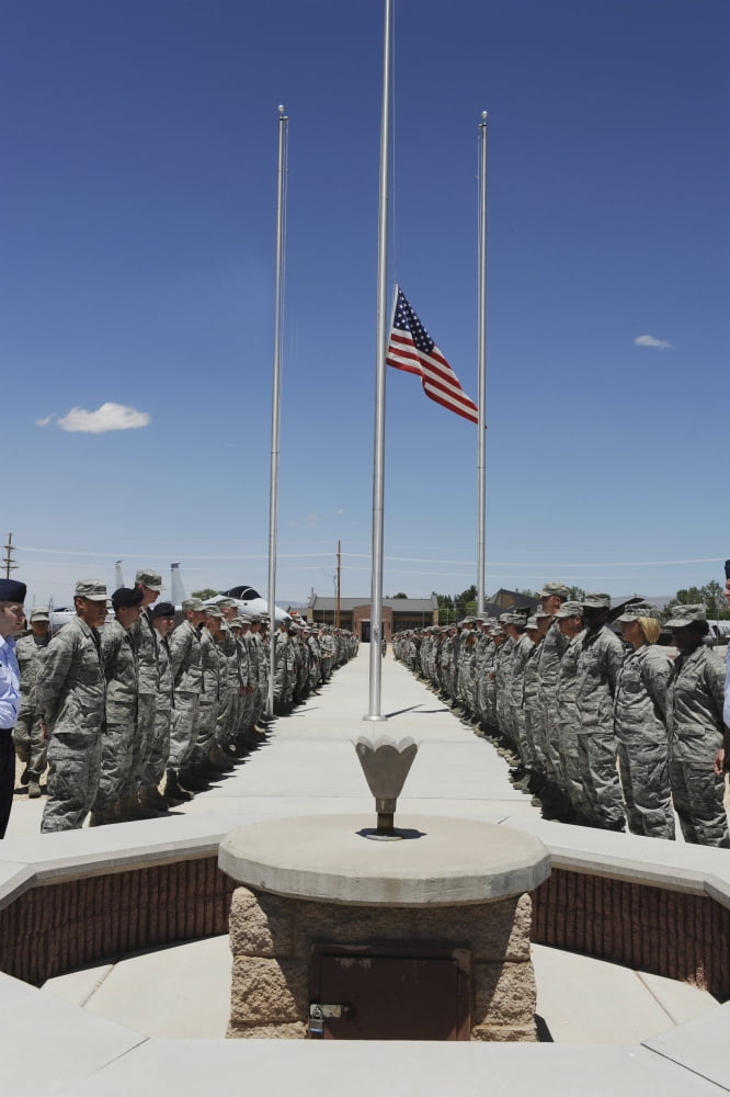 Members of Team Holloman stand before the POWMIA monument Canvas Art - Stocktrek Images (23 x 34)