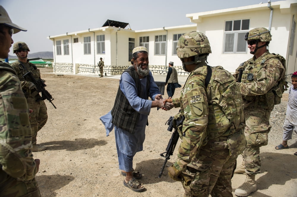 Members of the Kentucky National Guard meet with local Afghans Canvas Art - Stocktrek Images (35 x 23)