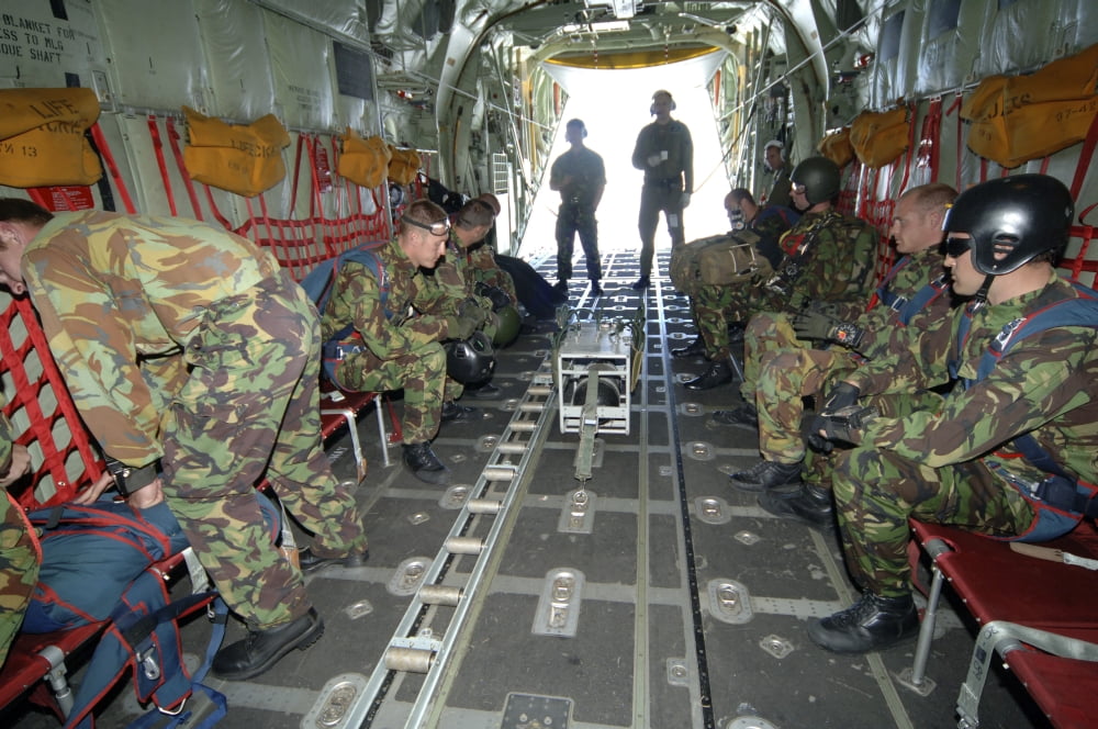 Members of the Pathfinder Platoon wait for parachute jump training aboard a C-130 Hercules Canvas Art - Andrew ChittockStocktrek Images (17 x 12)