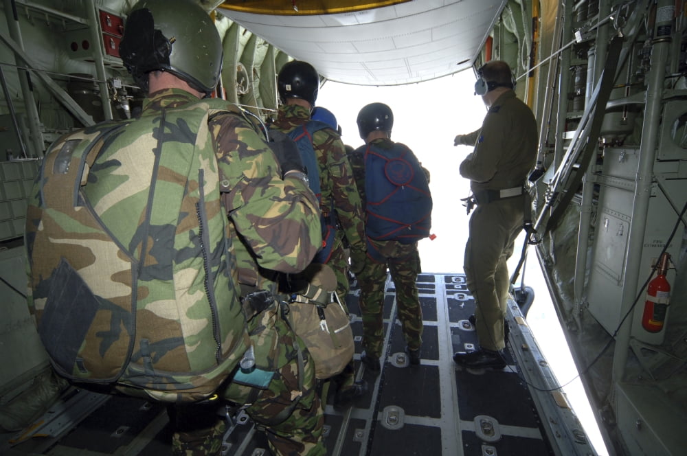 Members of the Pathfinder Platoon wait for parachute jump training aboard a C-130 Hercules Canvas Art - Andrew ChittockStocktrek Images (17 x 12)