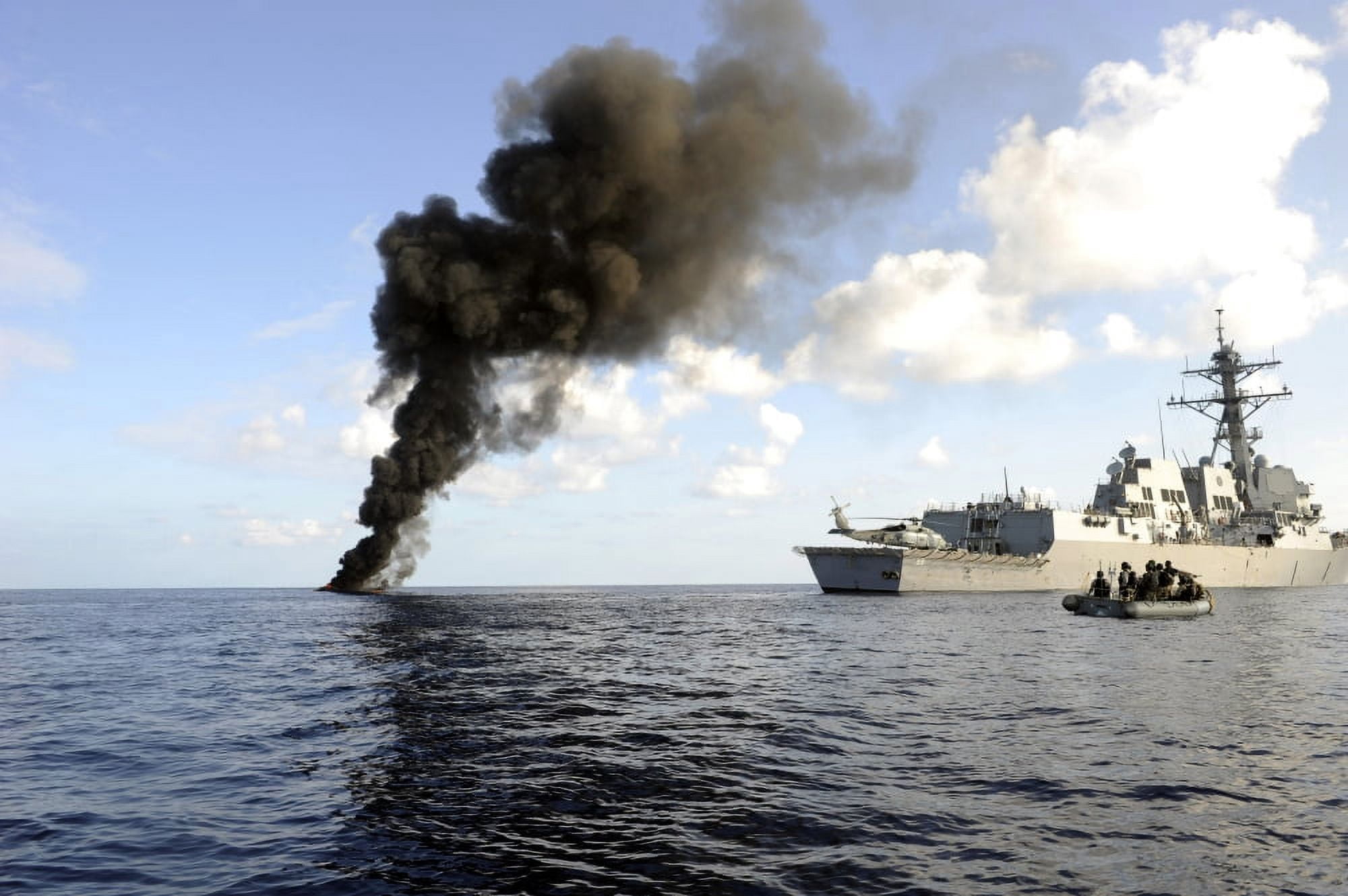 Members of the US Coast Guard law enforcement head towards the USS Farragut Canvas Art - Stocktrek Images (34 x 23)