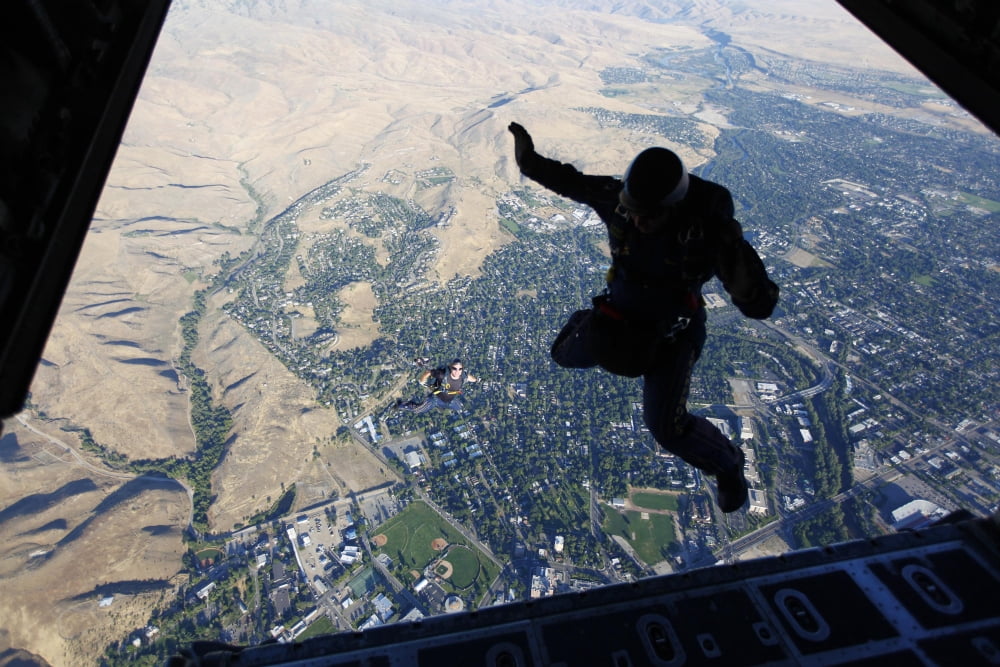 Members of the US Navy Parachute Team Leap Frogs jump above Boise Idaho Canvas Art - Stocktrek Images (34 x 23)