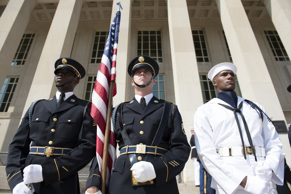 Members of the honor guard stand at attention in front of the Pentagon Canvas Art - Stocktrek Images (34 x 23)