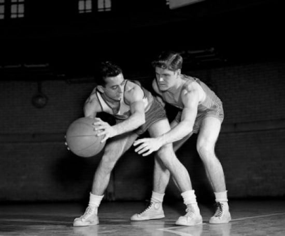 Men playing basketball in gym Canvas Art - (18 x 24)