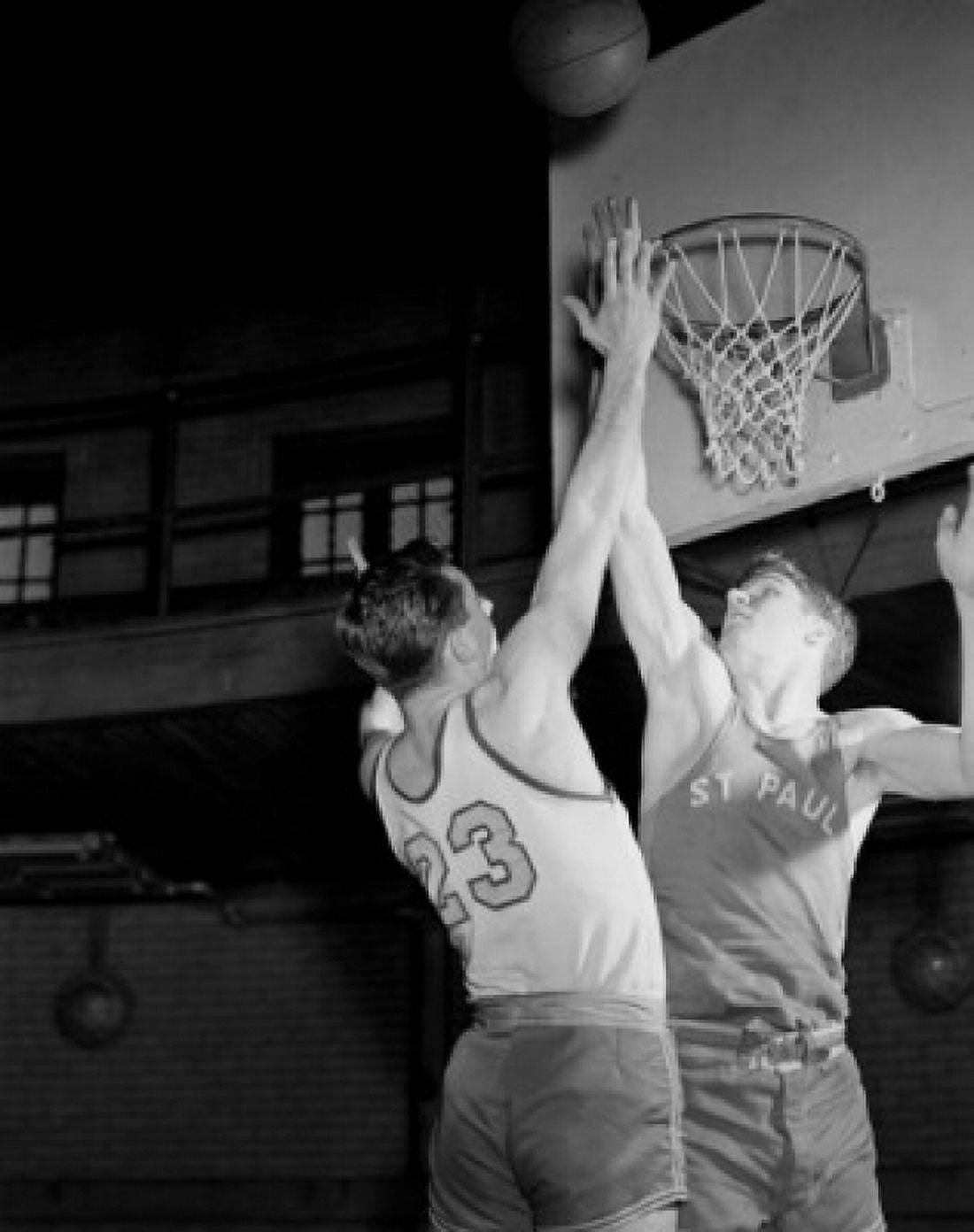 Men playing basketball in gym Canvas Art - (18 x 24)