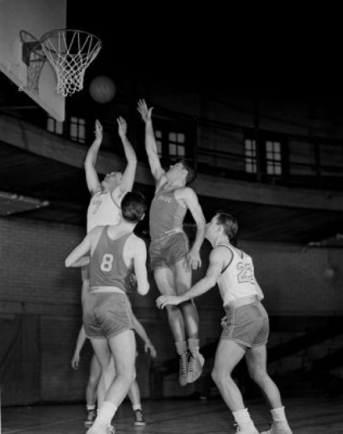 Men playing basketball in gym Canvas Art - (24 x 36)