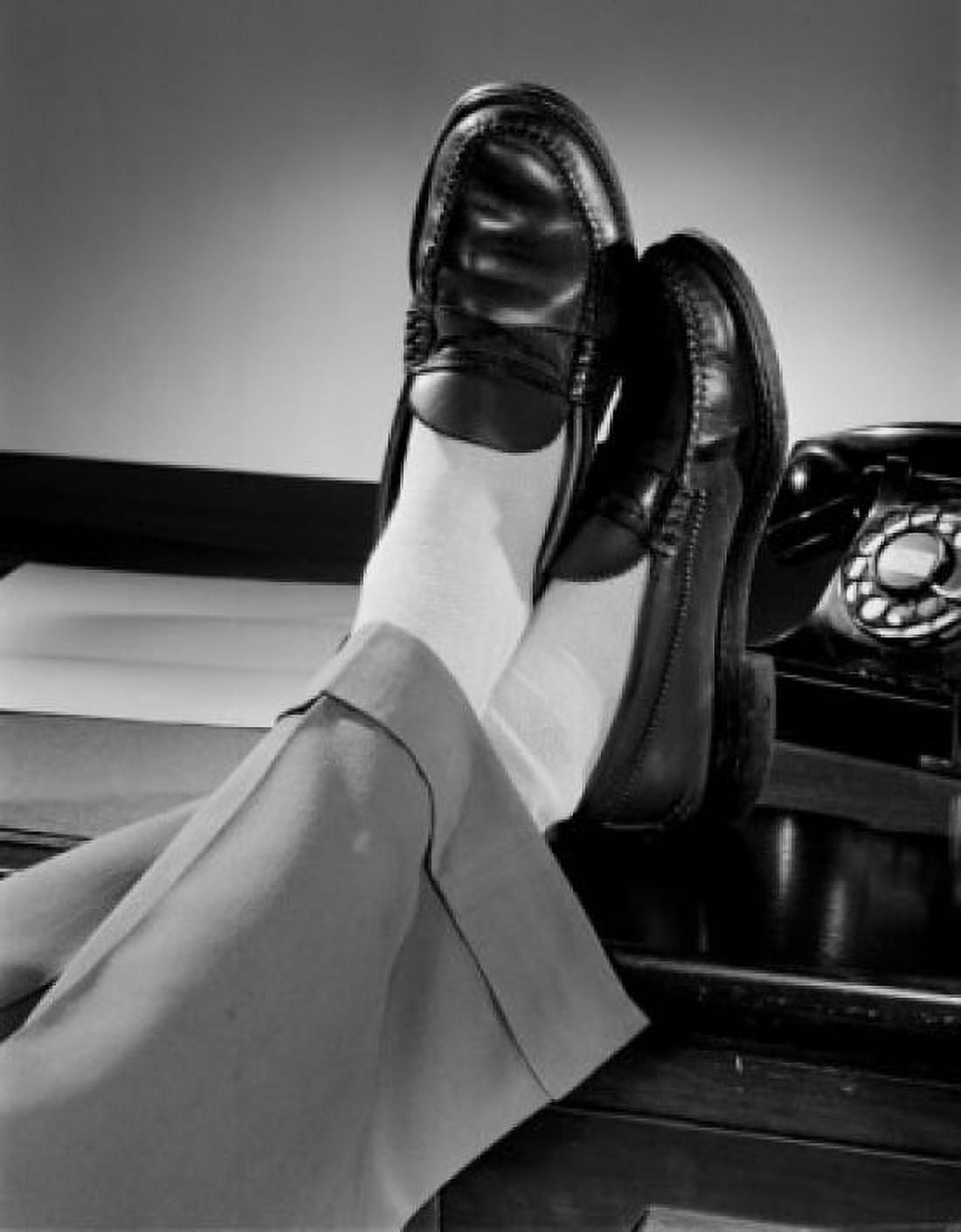 Mens feet on desk Canvas Art - (24 x 36)