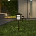 thumbnail image 1 of Merrick Lane Lantern Style All-Weather Outdoor LED Solar Lights, Brown Solar Powered Lights for Pathway, Garden, & Yard - Set of 8, 1 of 9