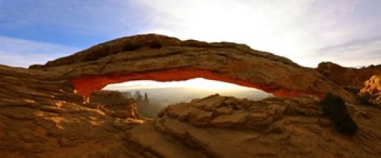 Mesa Arch glowing at sunrise Canyonlands National Park Utah USA Canvas Art - Panoramic Images (30 x 13)