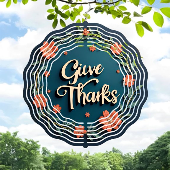 Metal Hanging Wind Spinners Featuring ' Give Thanks ' in Cursive Surrounded by Orange Flowers & Green Leaves