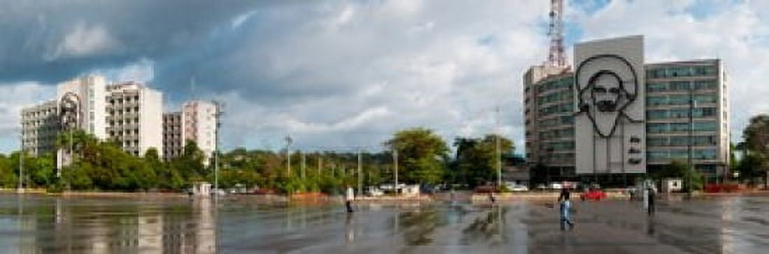 Metal sculptures of Camilo Cienfuegos and Che Guevara on two buildings Revolutionary Square Vedado Havana Cuba Canvas Art - Panoramic Images (36 x 12)