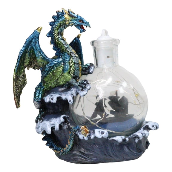 Metallic Frozen Sea Dragon Rising Above Waves by Glass Bottle With Ship Figurine