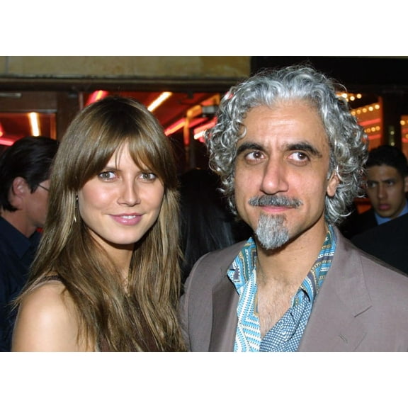 Miami Beach, FL 3-9-2002March cover girl Heidi Klum arrives at Crobar with husband Ric Pipino for Ocean Drive Magazine'sMarch, 2002 issue release party. Photo by Adam Scull (Heidi_Klum_husband6381)