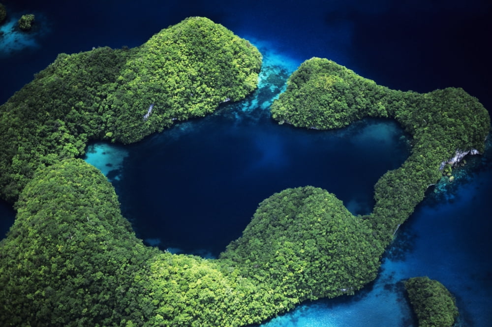 Micronesia Palau Aerial Of Rock Islands And Lagoon Rock Islands Canvas Art - Dave Fleetham Design Pics (17 x 11)