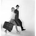 thumbnail image 1 of Mid Adult Couple Carrying Suitcases & Smiling Poster Print - 18 x 24 in., 1 of 1