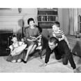 thumbnail image 1 of Mid Adult Couple with Children Near Fireplace Poster Print - 18 x 24 in., 1 of 1