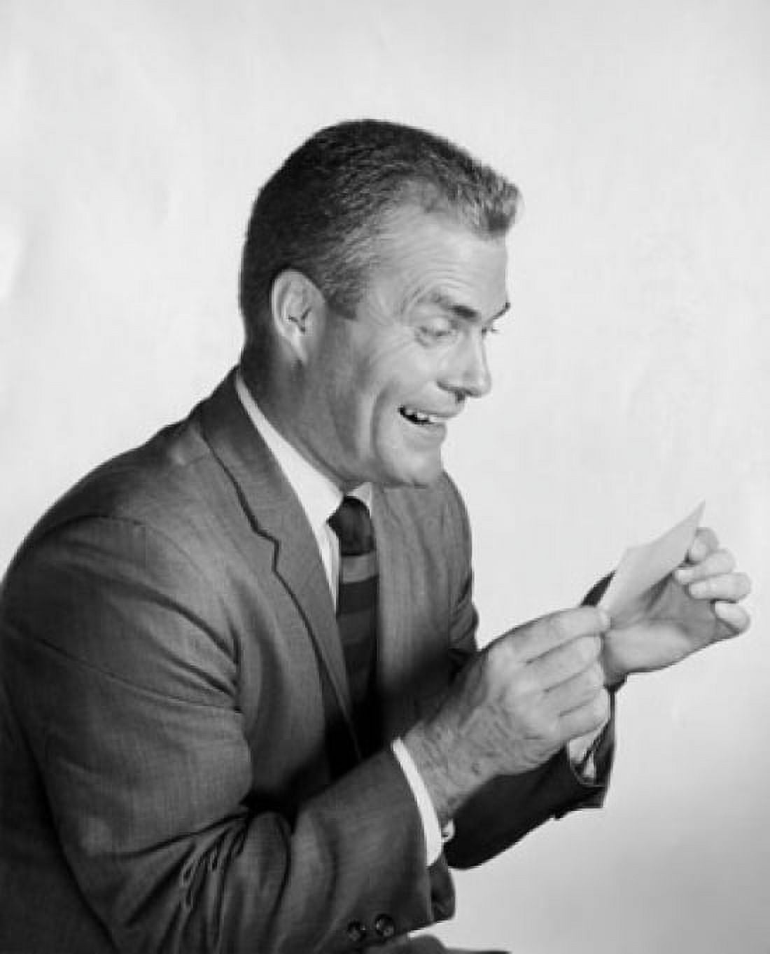 Mid adult businessman looking at cheque and smiling Canvas Art - (24 x 36)