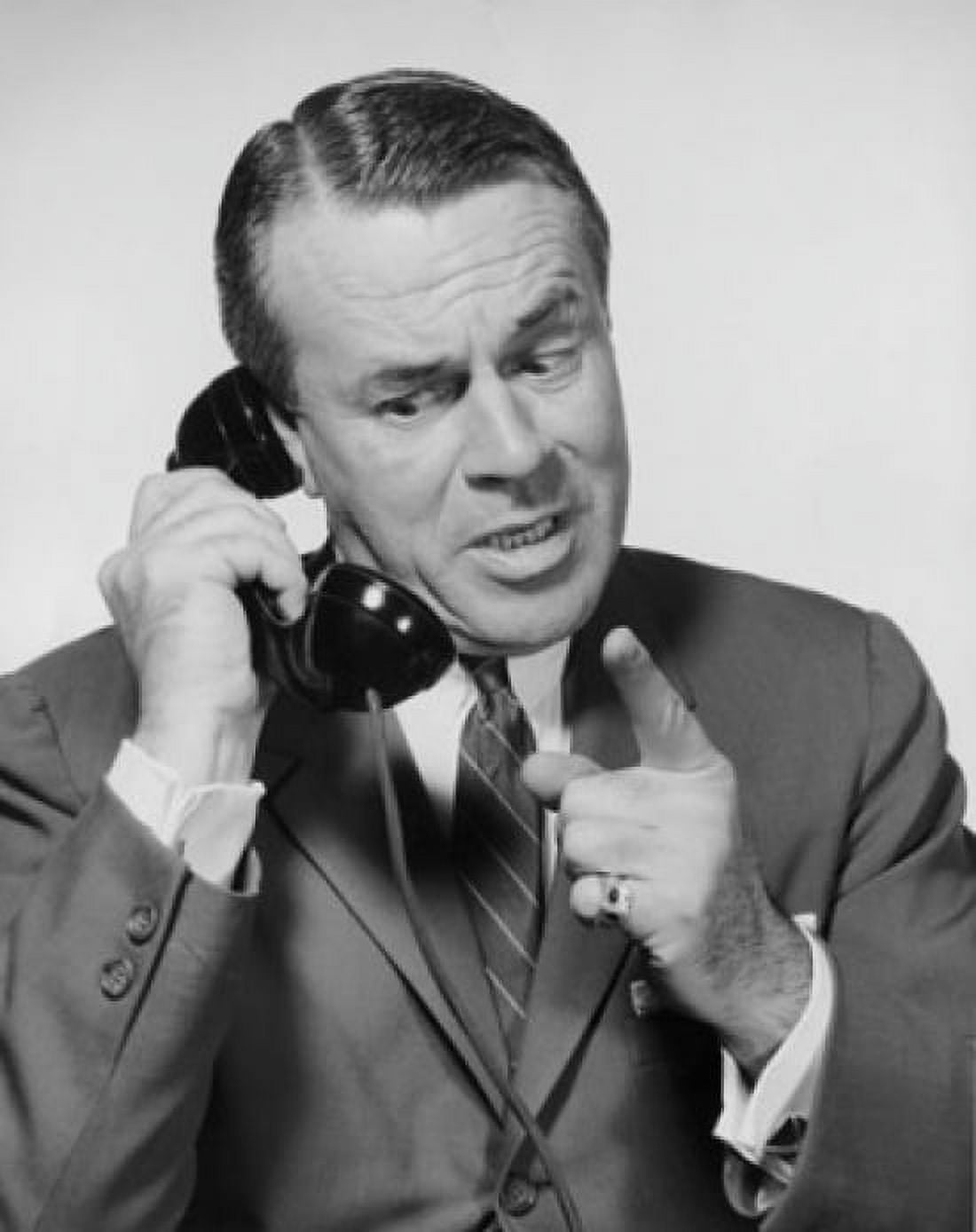 Mid adult businessman talking on telephone Canvas Art - (18 x 24)