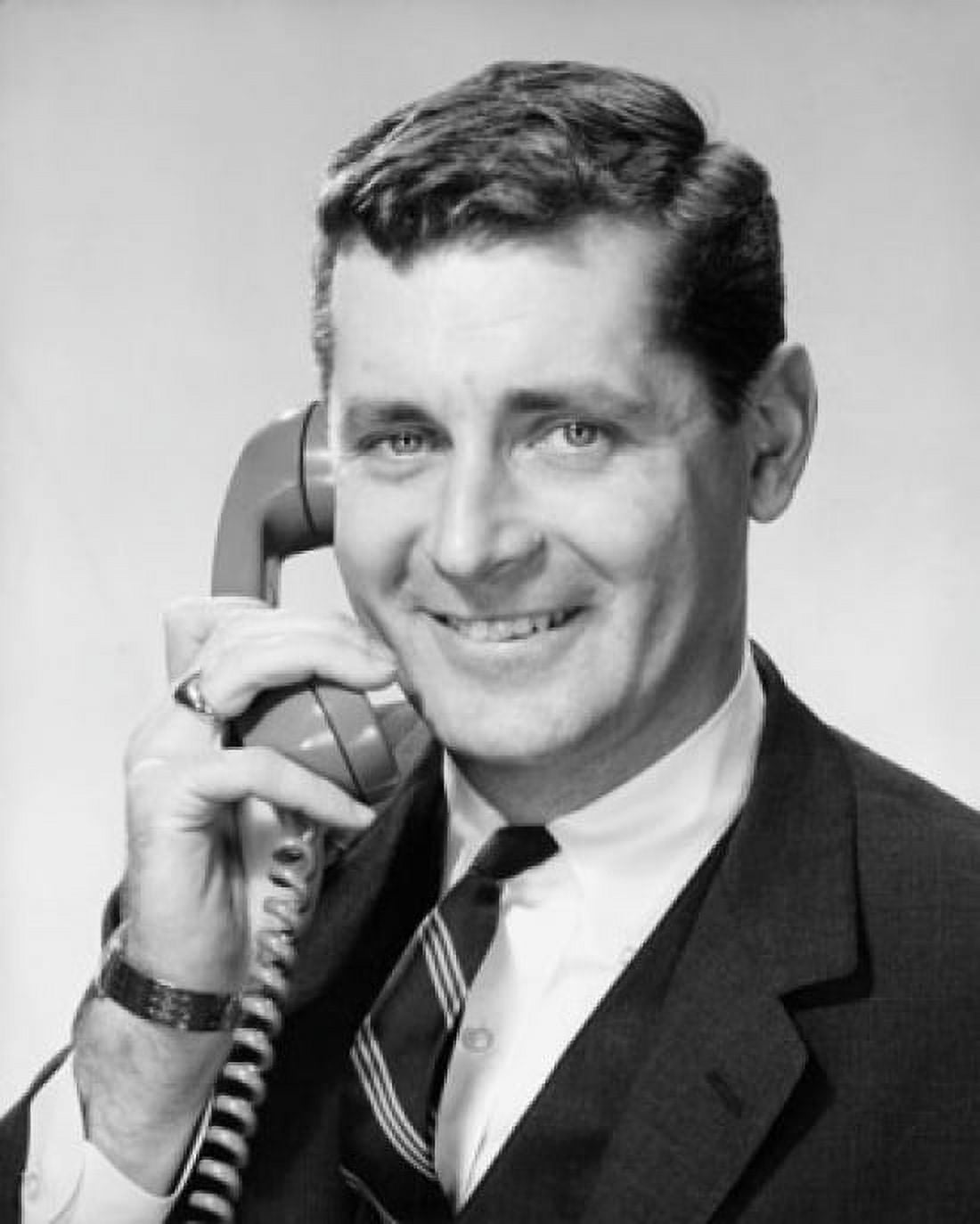 Mid adult businessman talking on telephone Canvas Art - (24 x 36)
