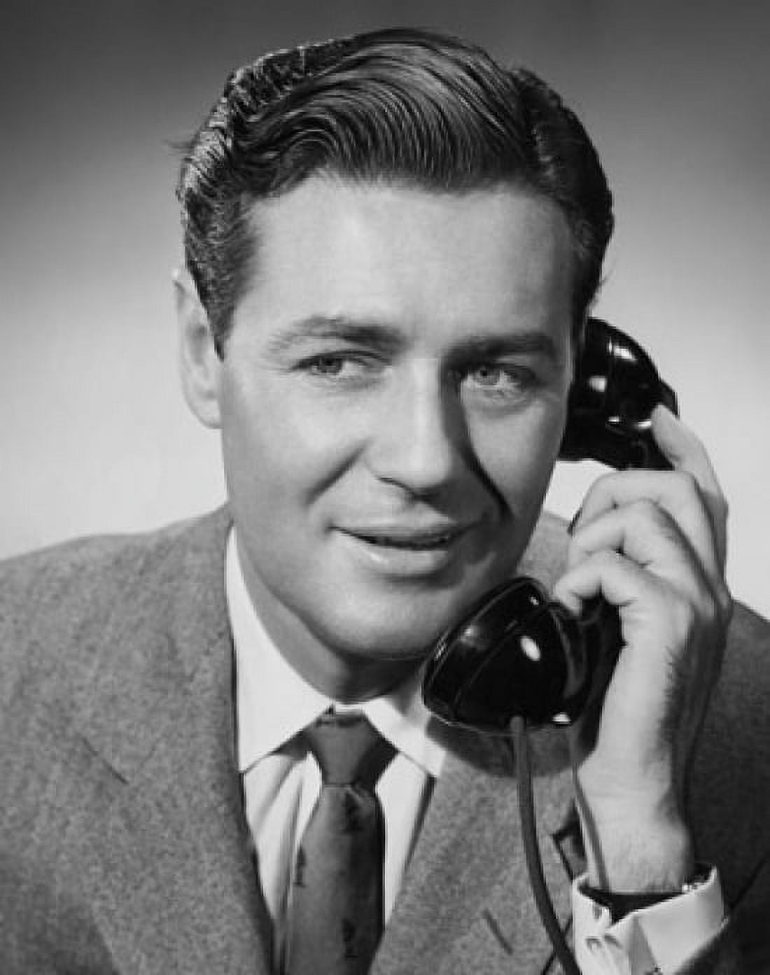 Mid adult businessman using telephone Canvas Art - (18 x 24)